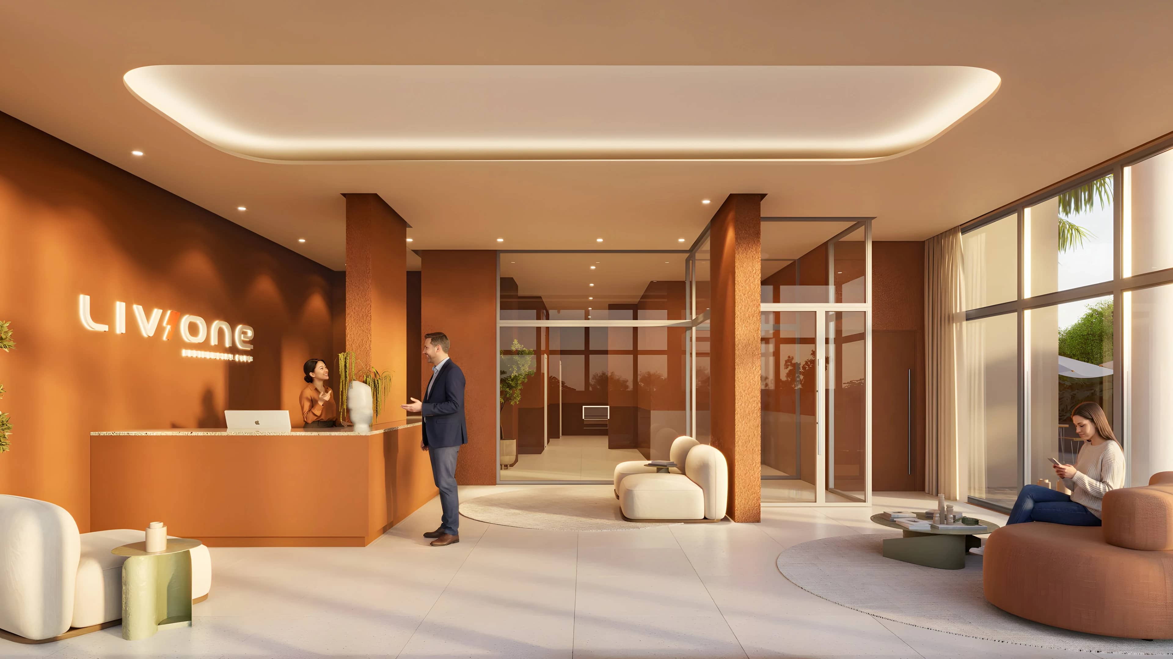 Lobby do Liv One com recepção e paredes cor de terracota