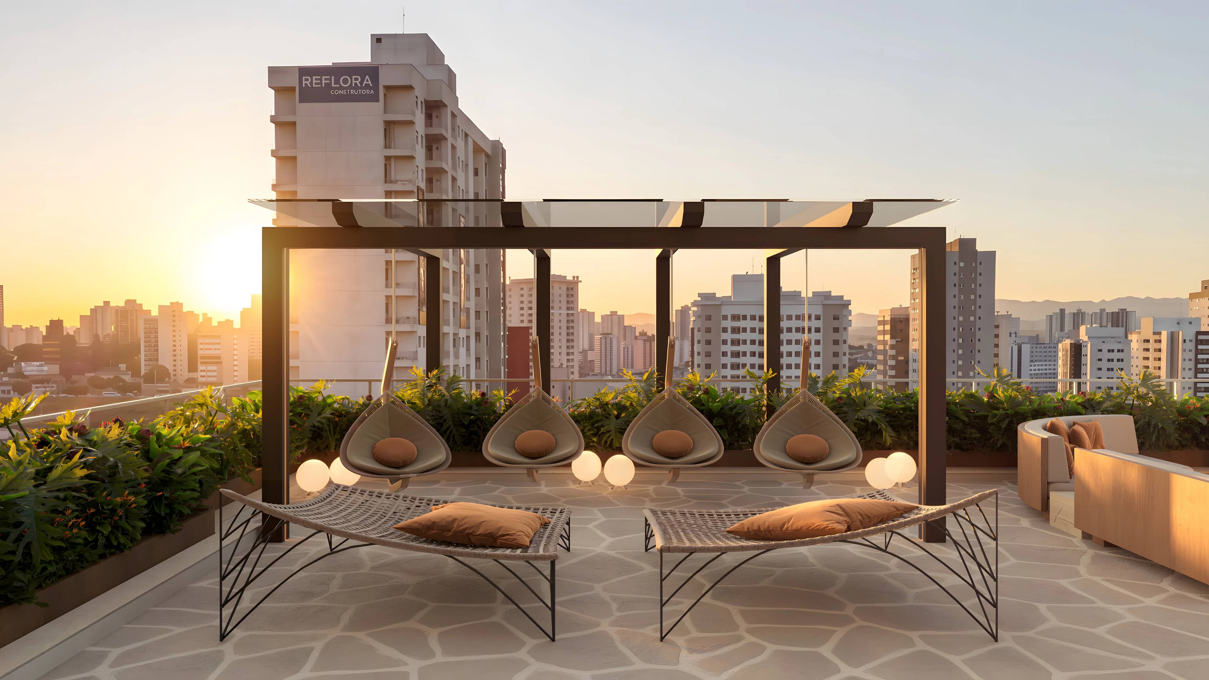 Lounge com pergolado e poltronas no rooftop do Liv One