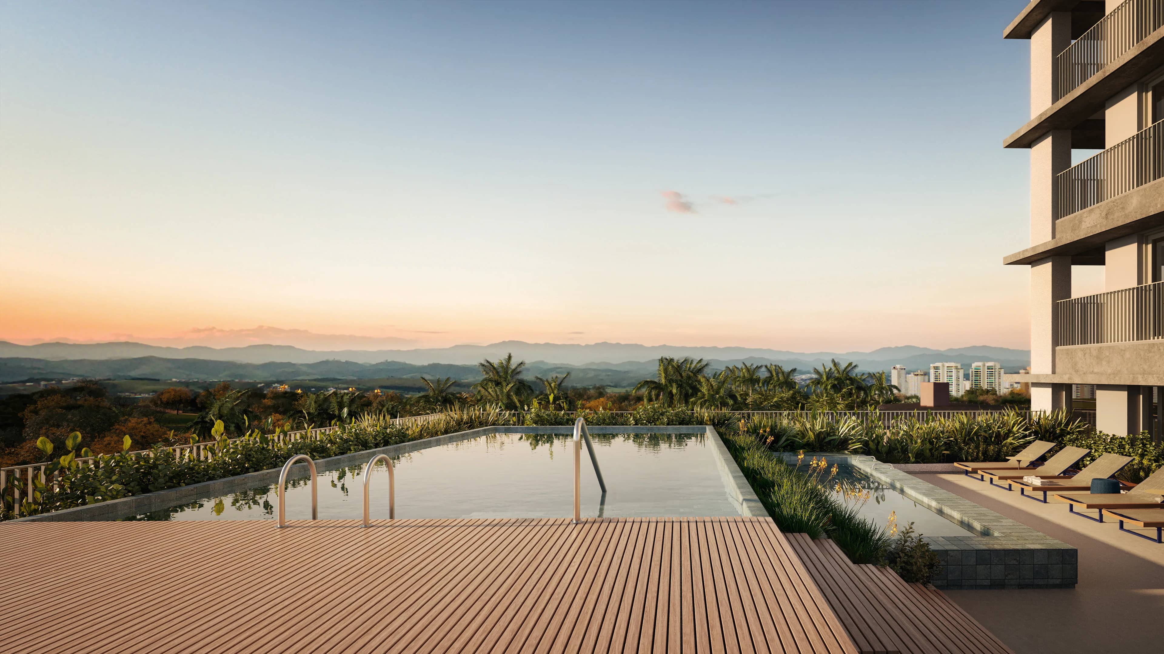 Piscina de borda do Riza ao pôr do sol com a serra ao fundo