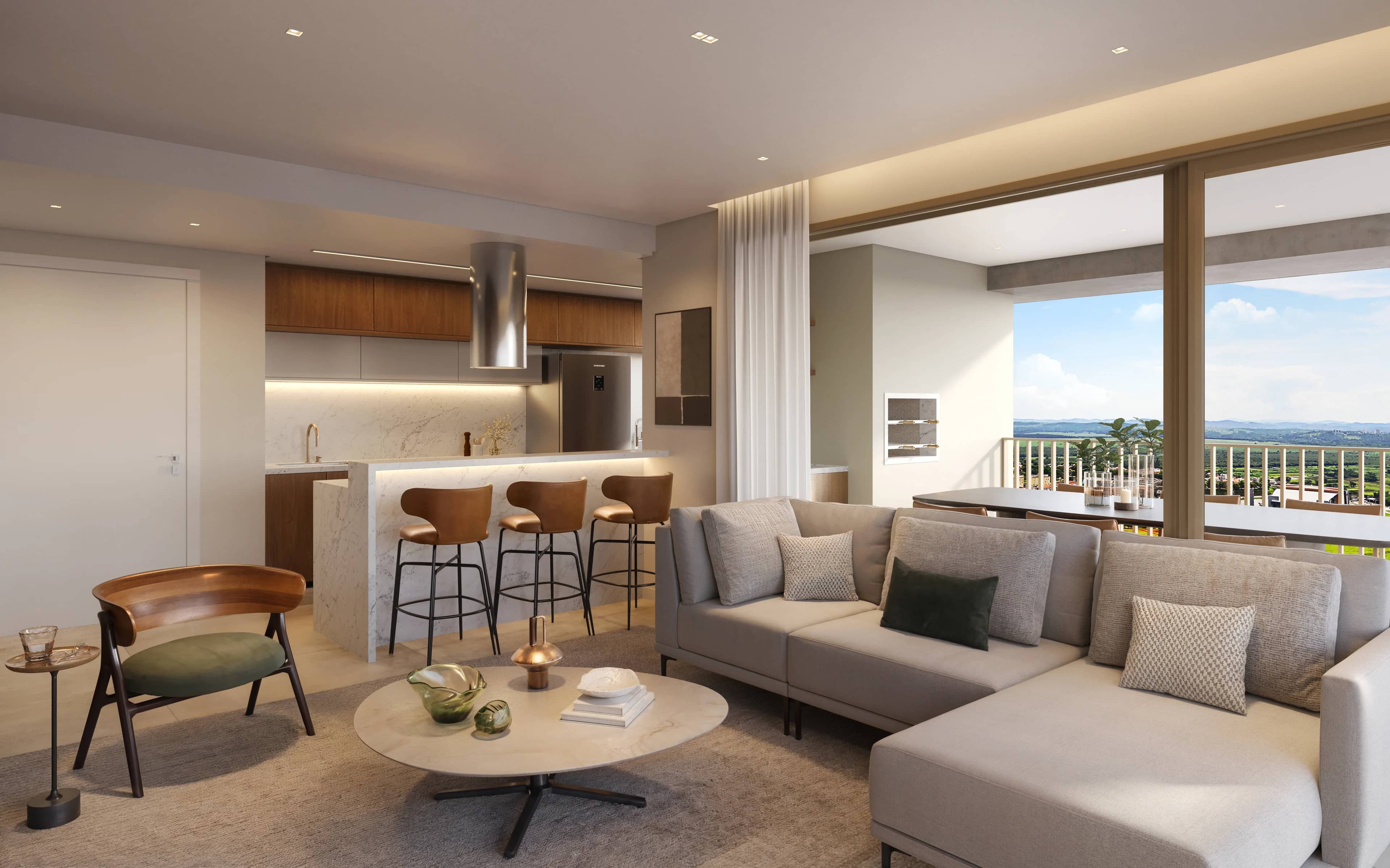 Sala ampla de apartamento de esquina do Riza com sofá e cozinha integrada