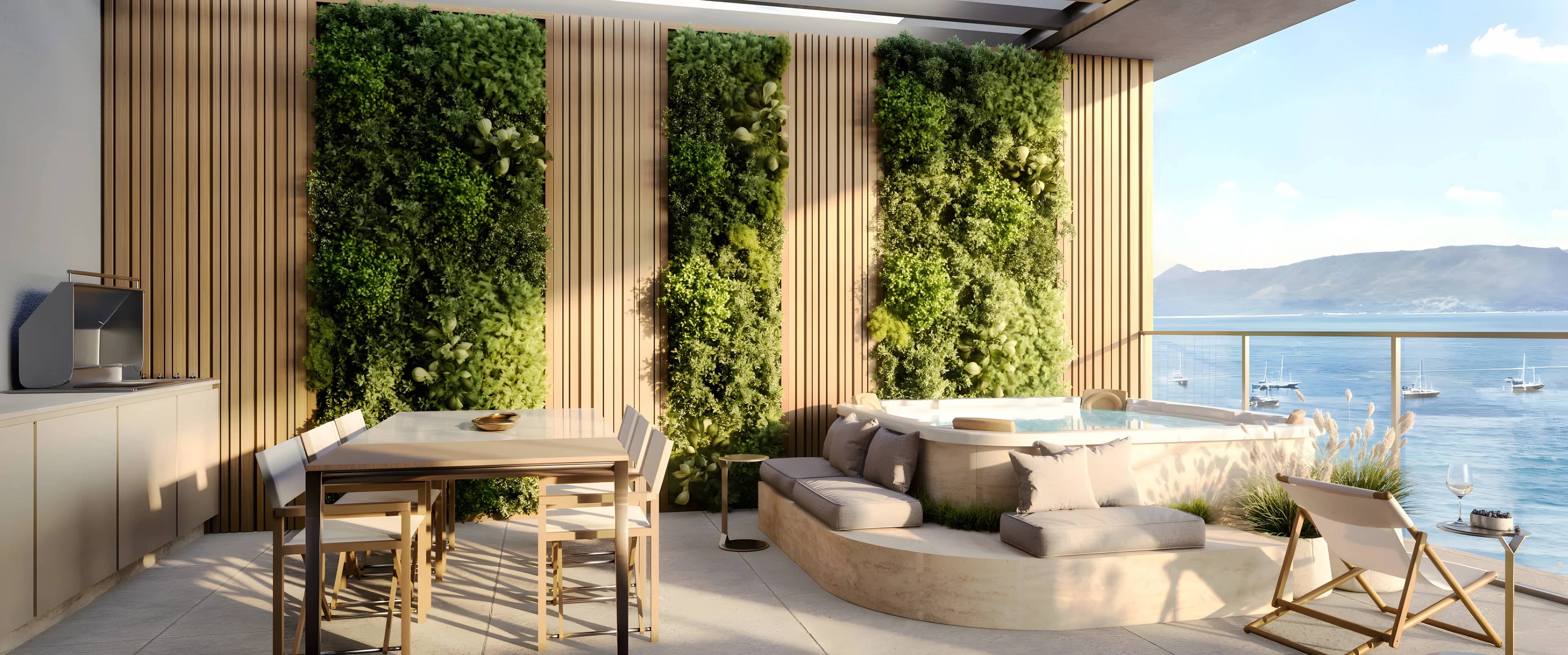 Terraço do duplex do Scenarium com jardim vertical, mesa e jacuzzi