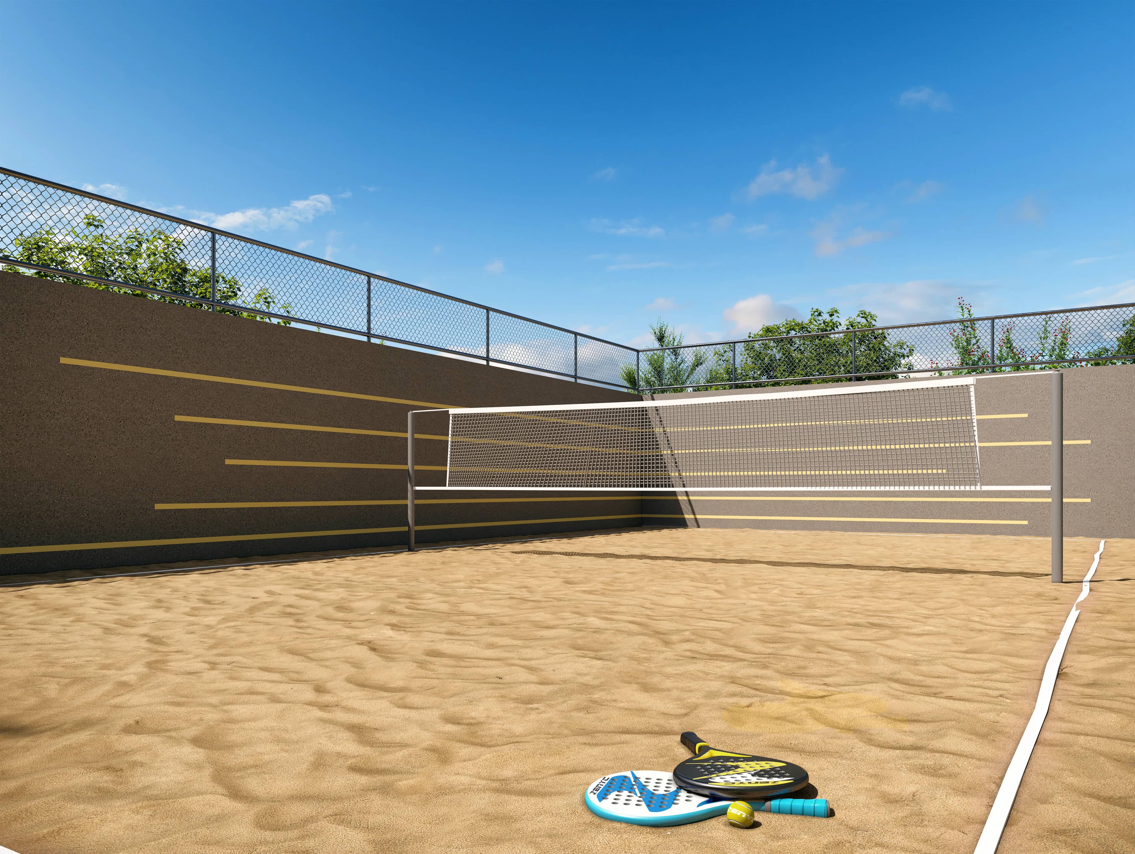 Quadra de areia do Vision Colinas com rede e raquetes de beach tennis