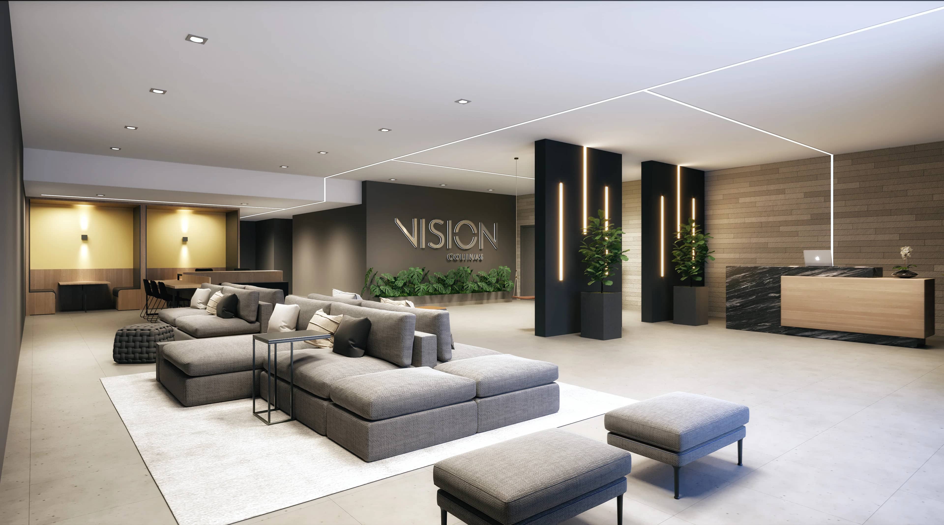 Lobby do Vision Colinas com sofás claros e pilares com luz embutida
